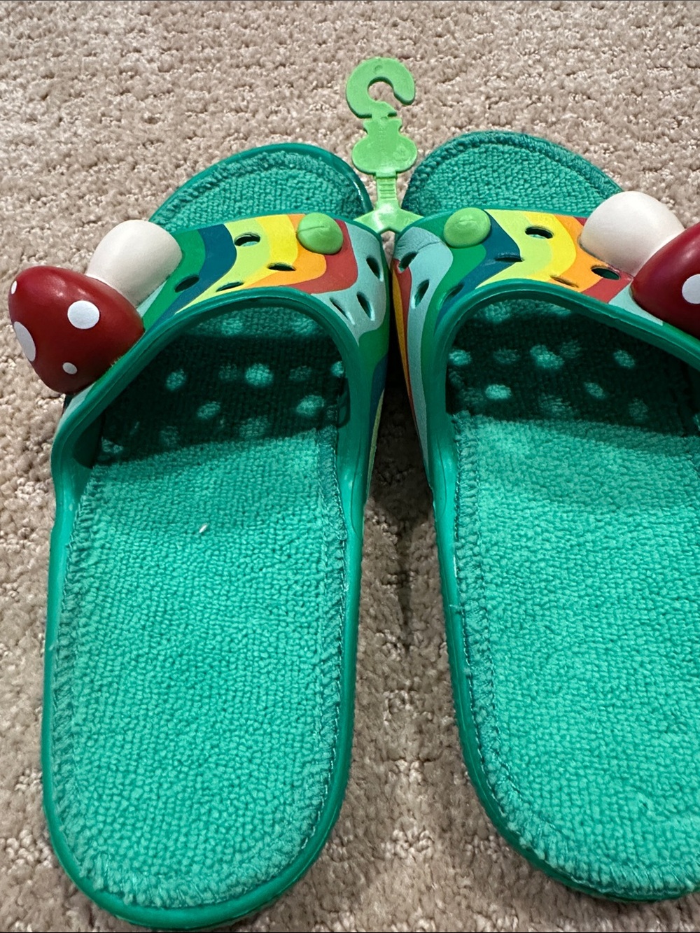 CROCS Teal Slide Sandals with Rainbow Straps and Red Mushroom Charms - Picture 2 of 6